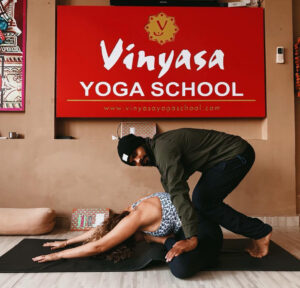 Mastering Hands-On Adjustments: A Comprehensive Guide to Vinyasa Yoga Teacher Training in Rishikesh